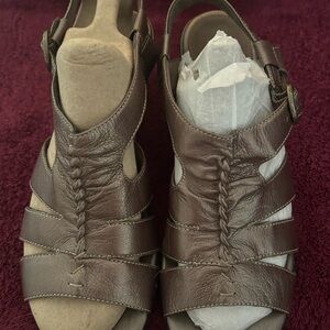 Clark sandals pewter color.